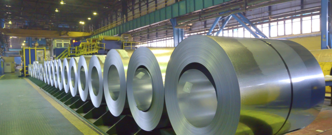 packed coils of steel sheet inside of plant